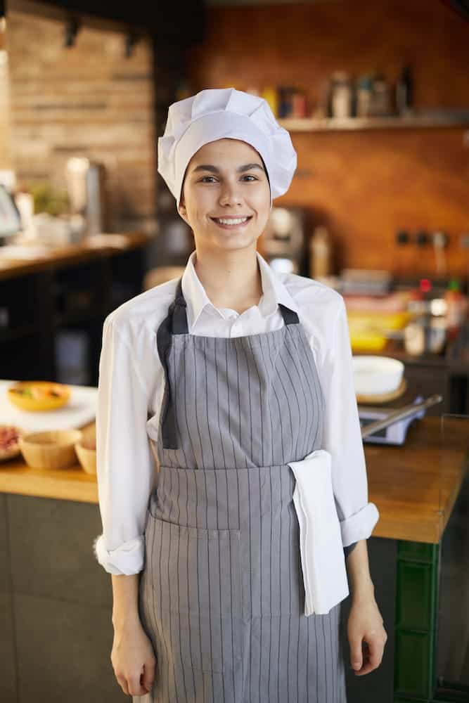 portrait-of-young-cook-wearing-chefs-hat